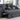 Cody II - Convertible Sleeper Loveseat With Cup Holder, Charging Ports and Pocket - Dark Gray